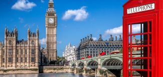 London symbols with BIG BEN, DOUBLE DECKER BUSES and Red Phone Booth in England, UK